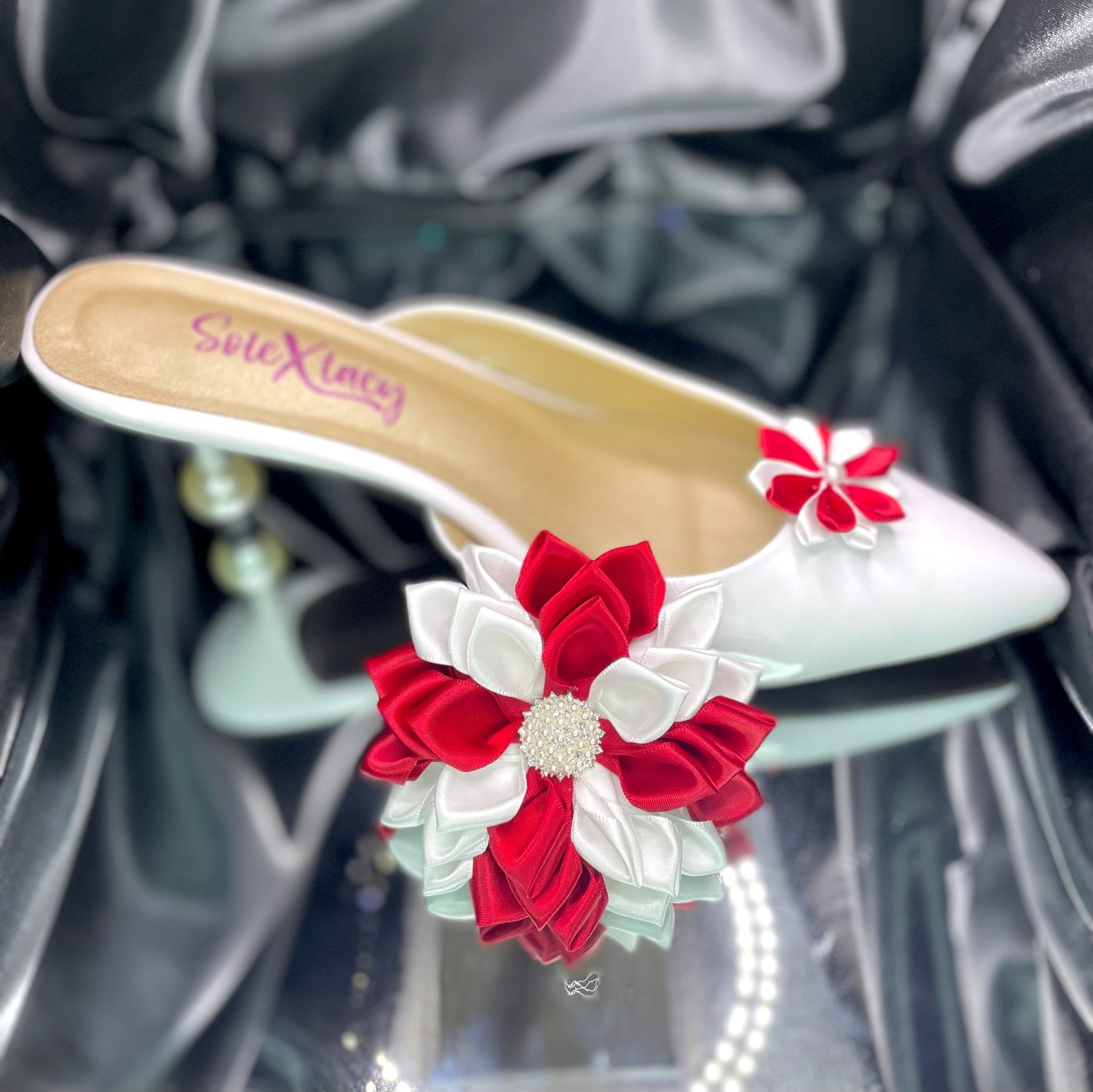 White flat shoe with red and white ribbon kanzashi flower clip on top