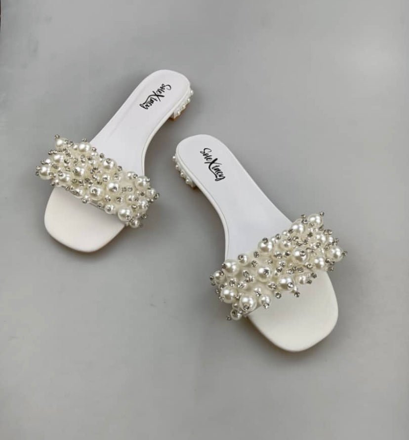 White slide sandal featuring a wide pearl and rhinestone decorated strap, flat sole, stylish for bridal or elegant events, SKU: SH-002