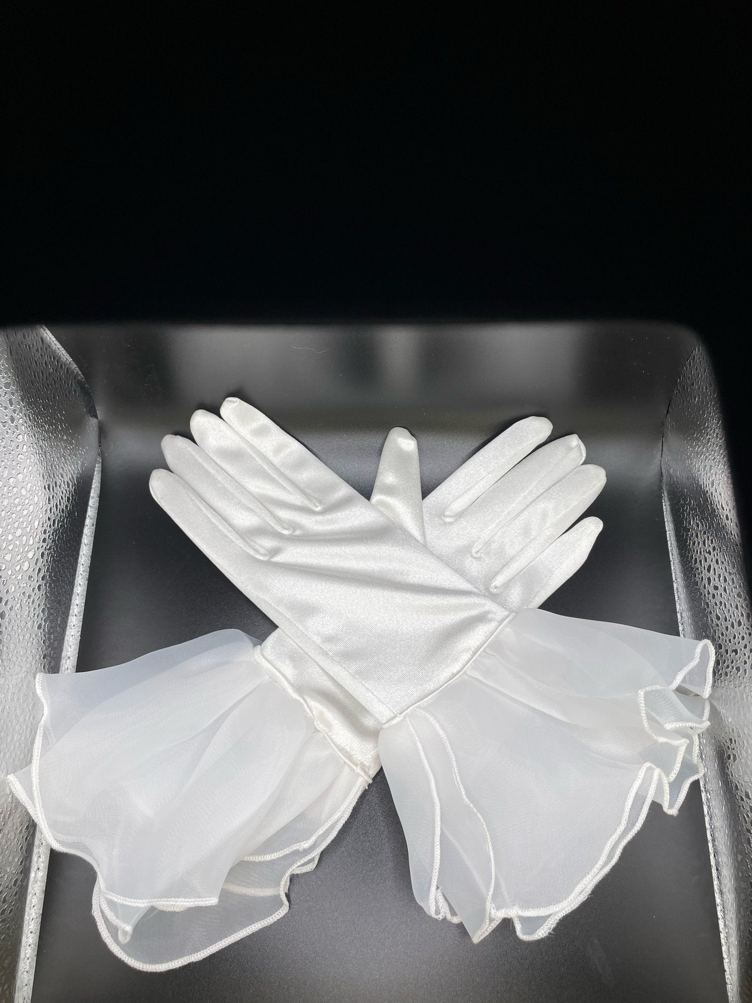 White ruffled gloves with layered cuffs
