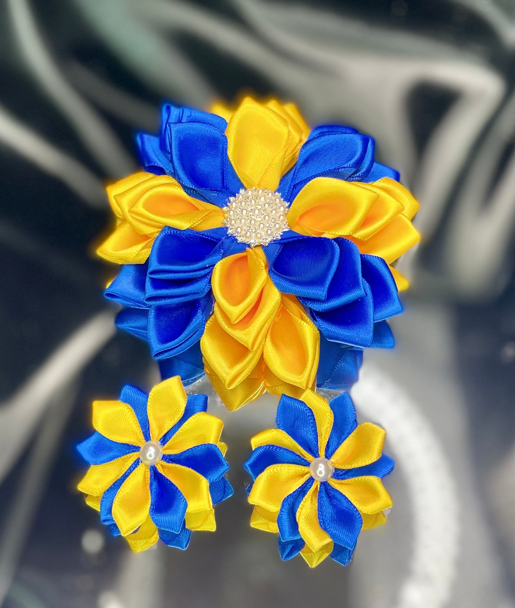 Blue and yellow kanzashi flower set with one large rosette and two small rosettes
